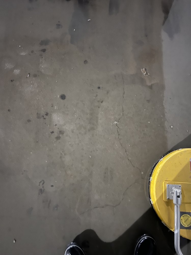 Concrete surface cleaning with rotary attachment