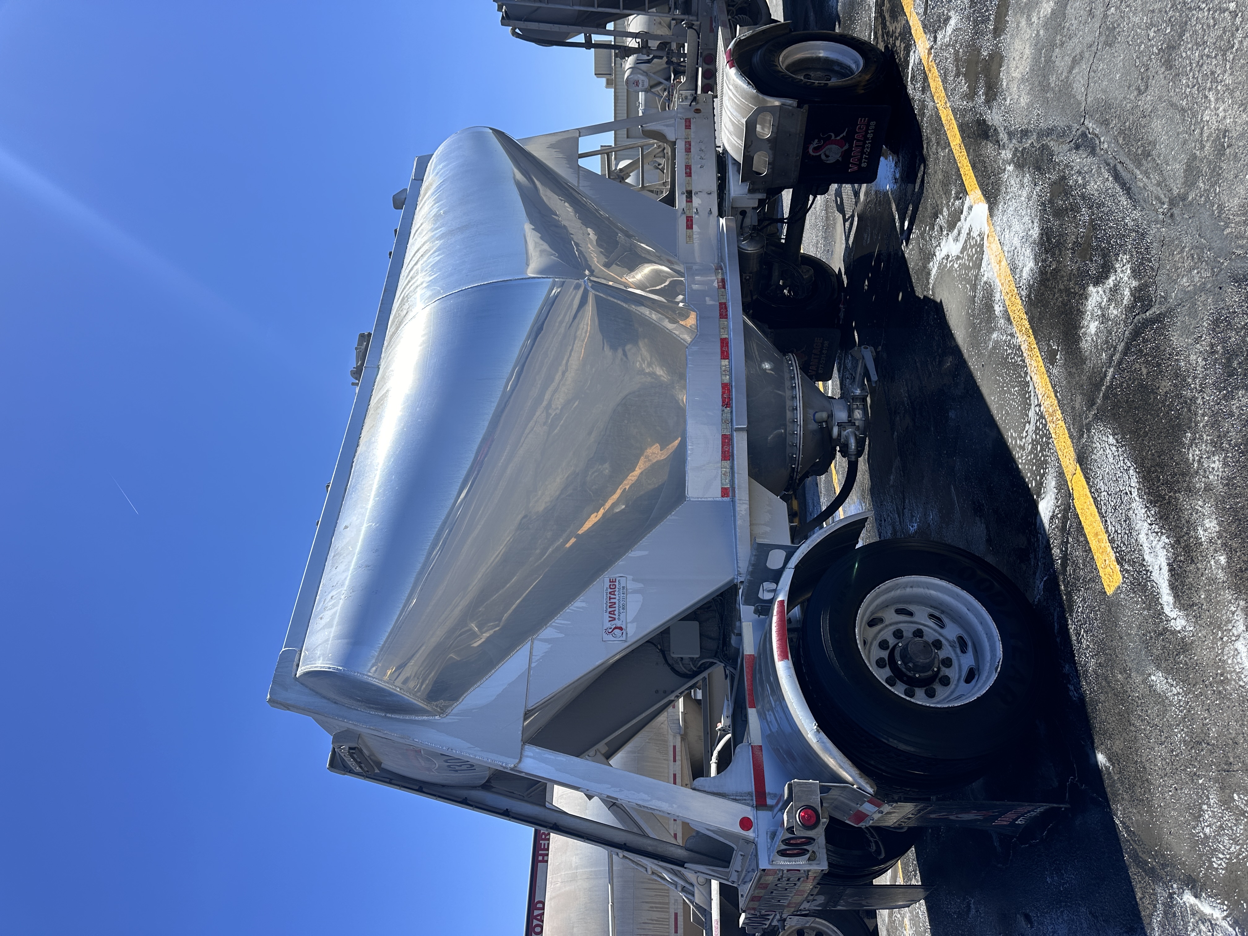 Same Vantage dry-bulk trailer gleaming clean after Prime Pressure Clean fleet wash